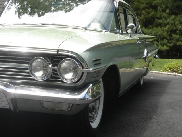 1960 impala 4dr sedan grn 16.JPG